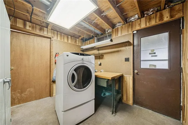 a utility room with dryer and washer