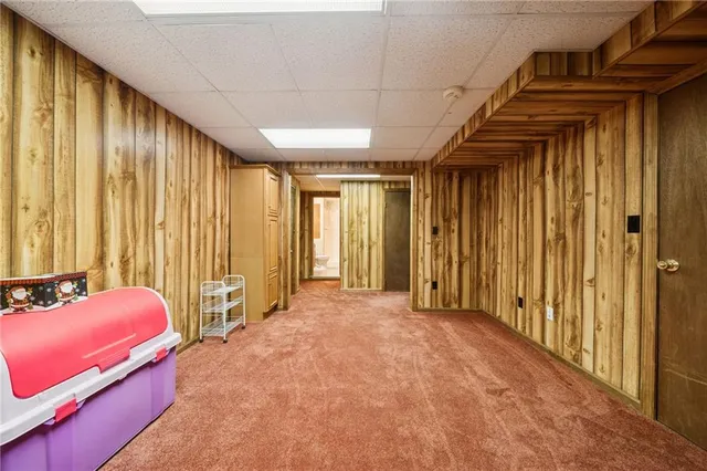 a view of a bedroom with windows