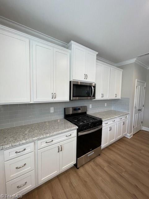 3198 Riley Ford Trail High Point, NC 27265 - Photo 7 of 32 Kitchen with gas stove