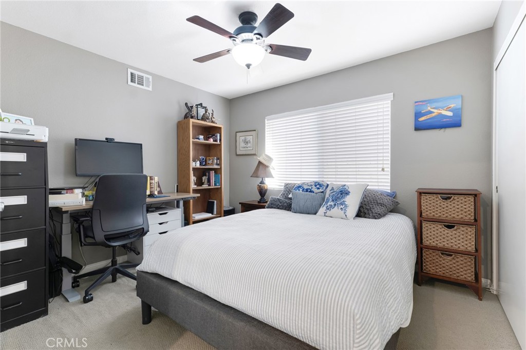 3843 San Gabriel Street Simi Valley, CA 93063 - Photo 27 of 52 a bedroom with a bed furniture and a window