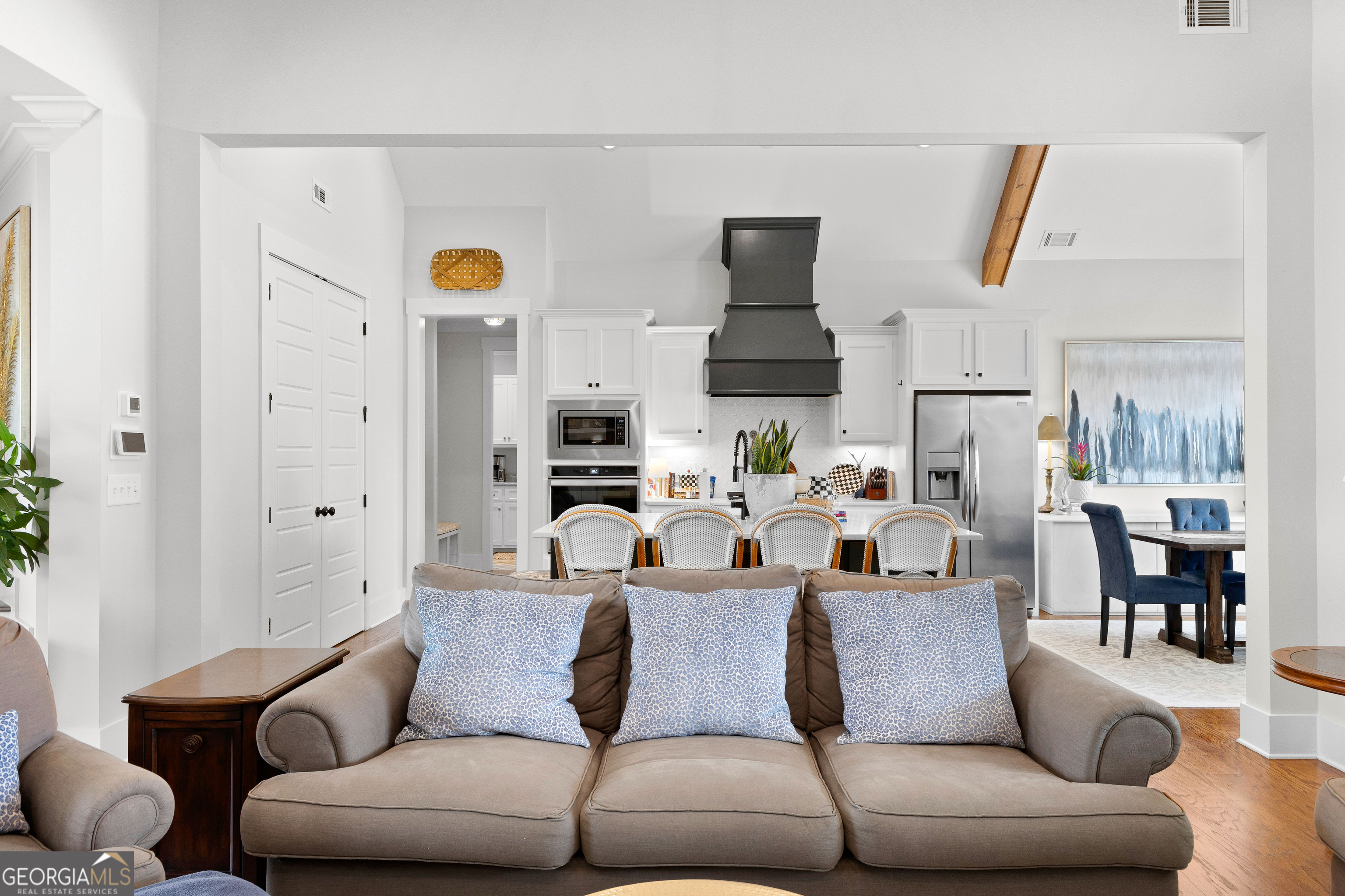 21 Waterview Circle Newnan, GA 30263 - Photo 16 of 75 a living room with furniture kitchen view and a chandelier