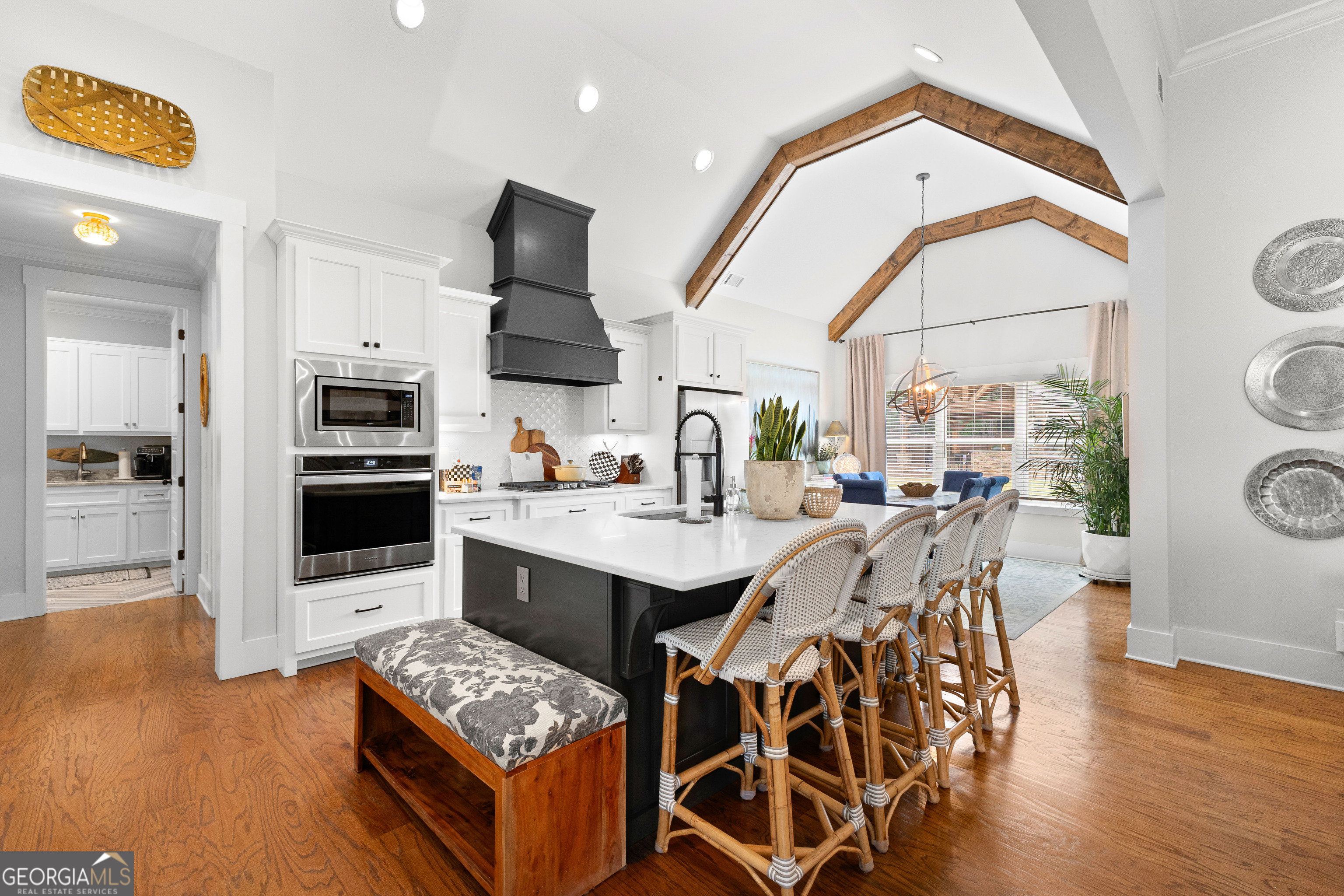 21 Waterview Circle Newnan, GA 30263 - Photo 3 of 75 a kitchen with stainless steel appliances kitchen island granite countertop a stove a sink and a microwave