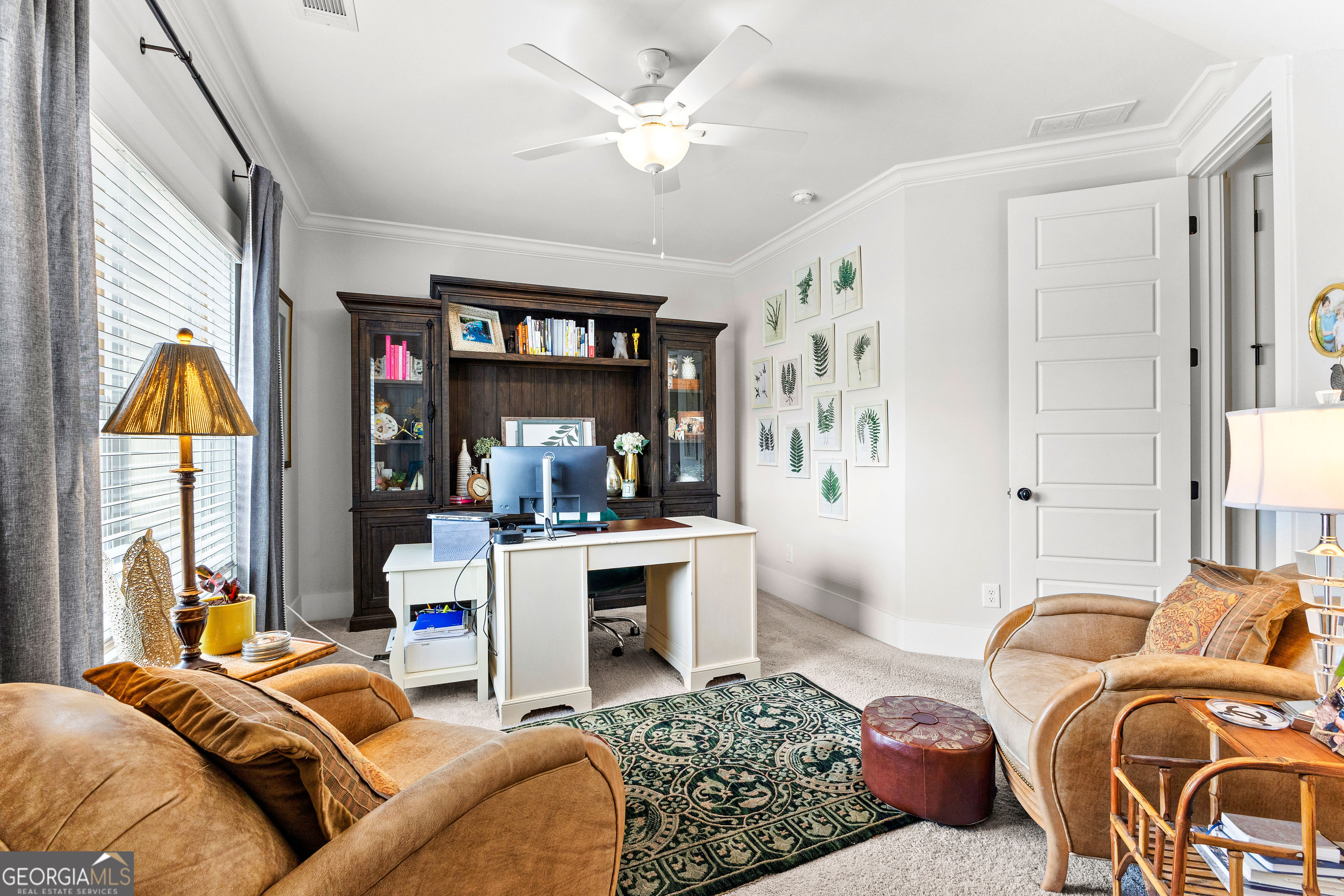 21 Waterview Circle Newnan, GA 30263 - Photo 37 of 75 a living room with furniture a ceiling fan and a window