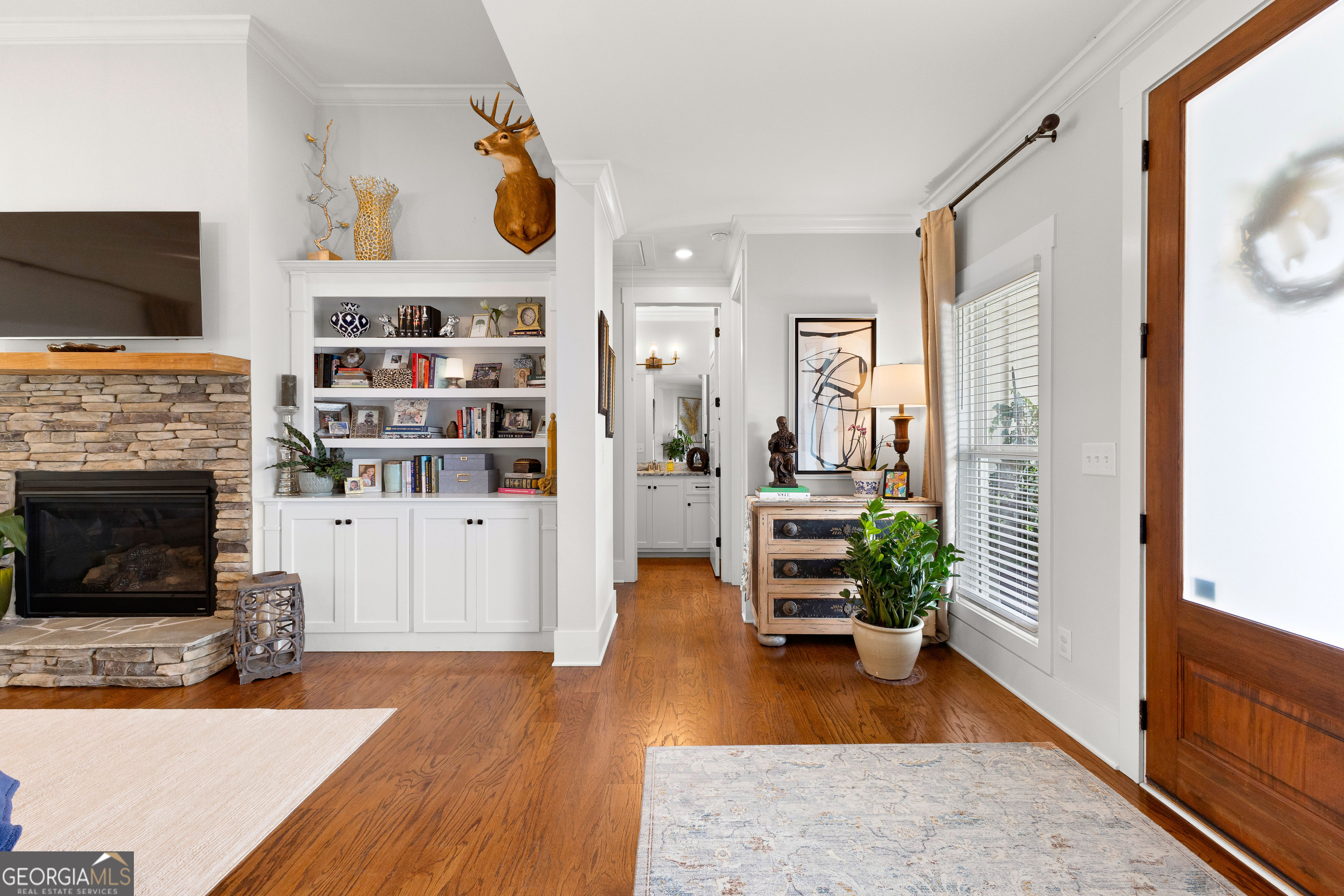 21 Waterview Circle Newnan, GA 30263 - Photo 40 of 75 a living room with furniture and a fireplace