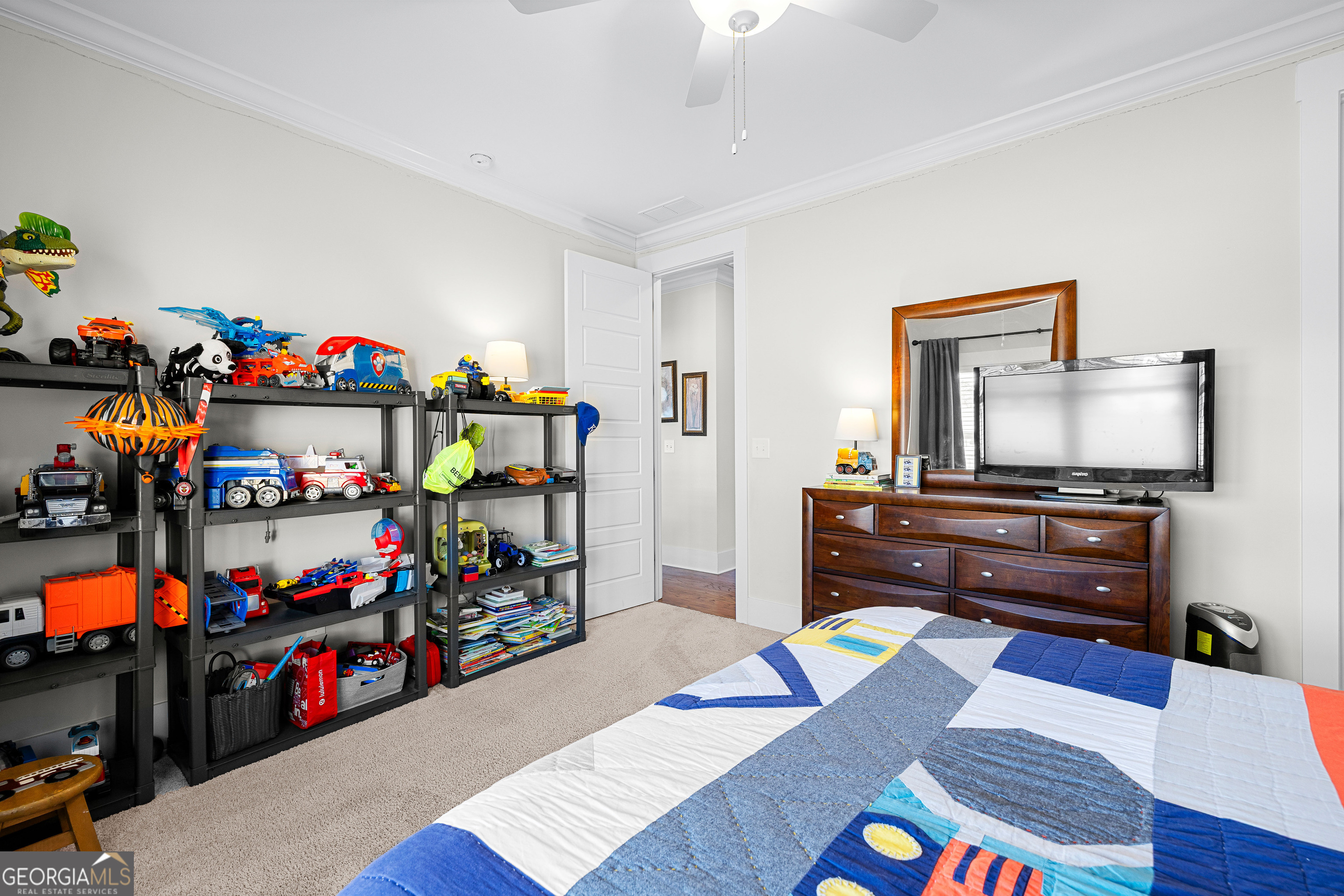 21 Waterview Circle Newnan, GA 30263 - Photo 44 of 75 a living room with furniture and a flat screen tv