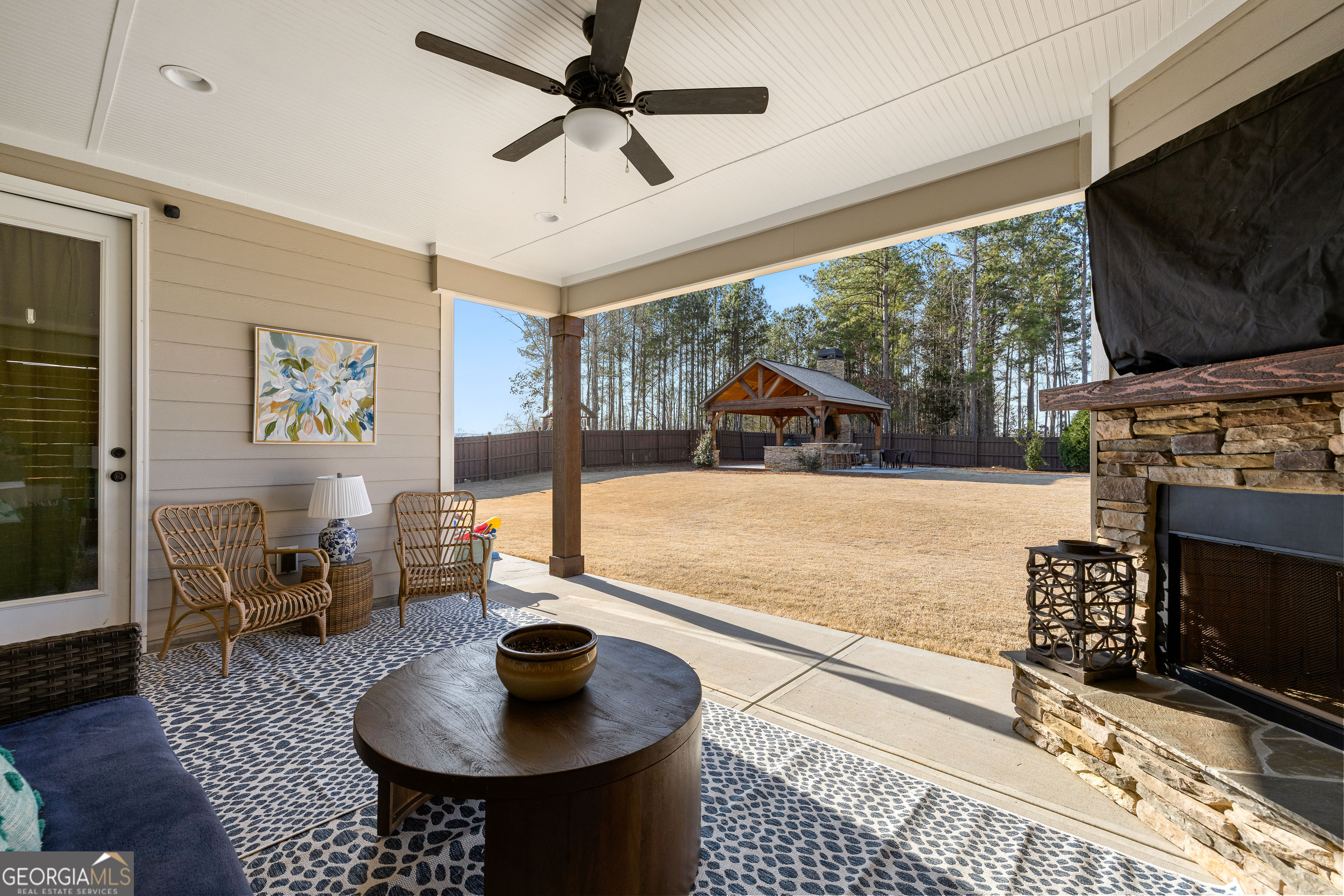21 Waterview Circle Newnan, GA 30263 - Photo 64 of 75 a living room with furniture and a flat screen tv