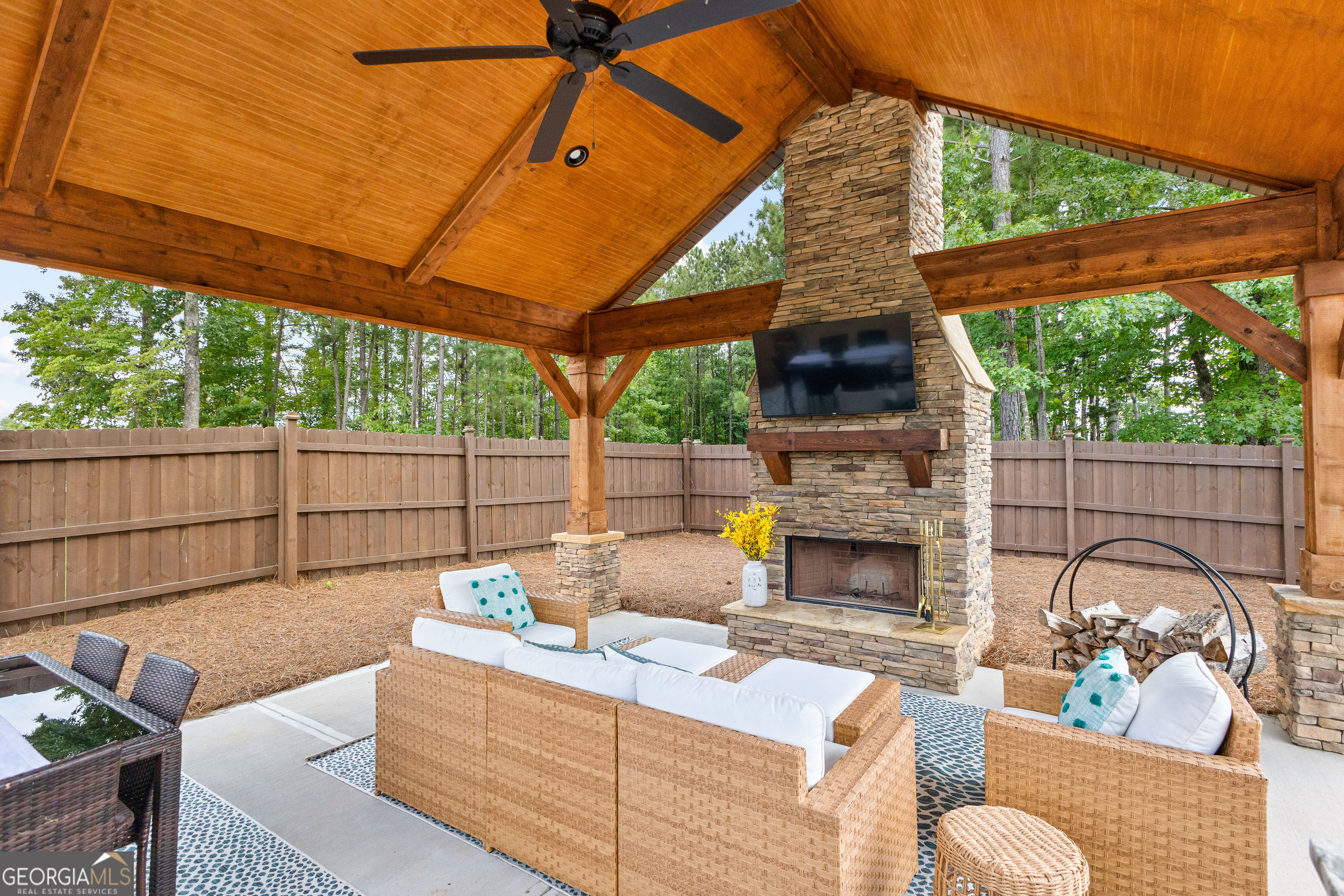 21 Waterview Circle Newnan, GA 30263 - Photo 70 of 75 a outdoor living space with furniture a fireplace and a window