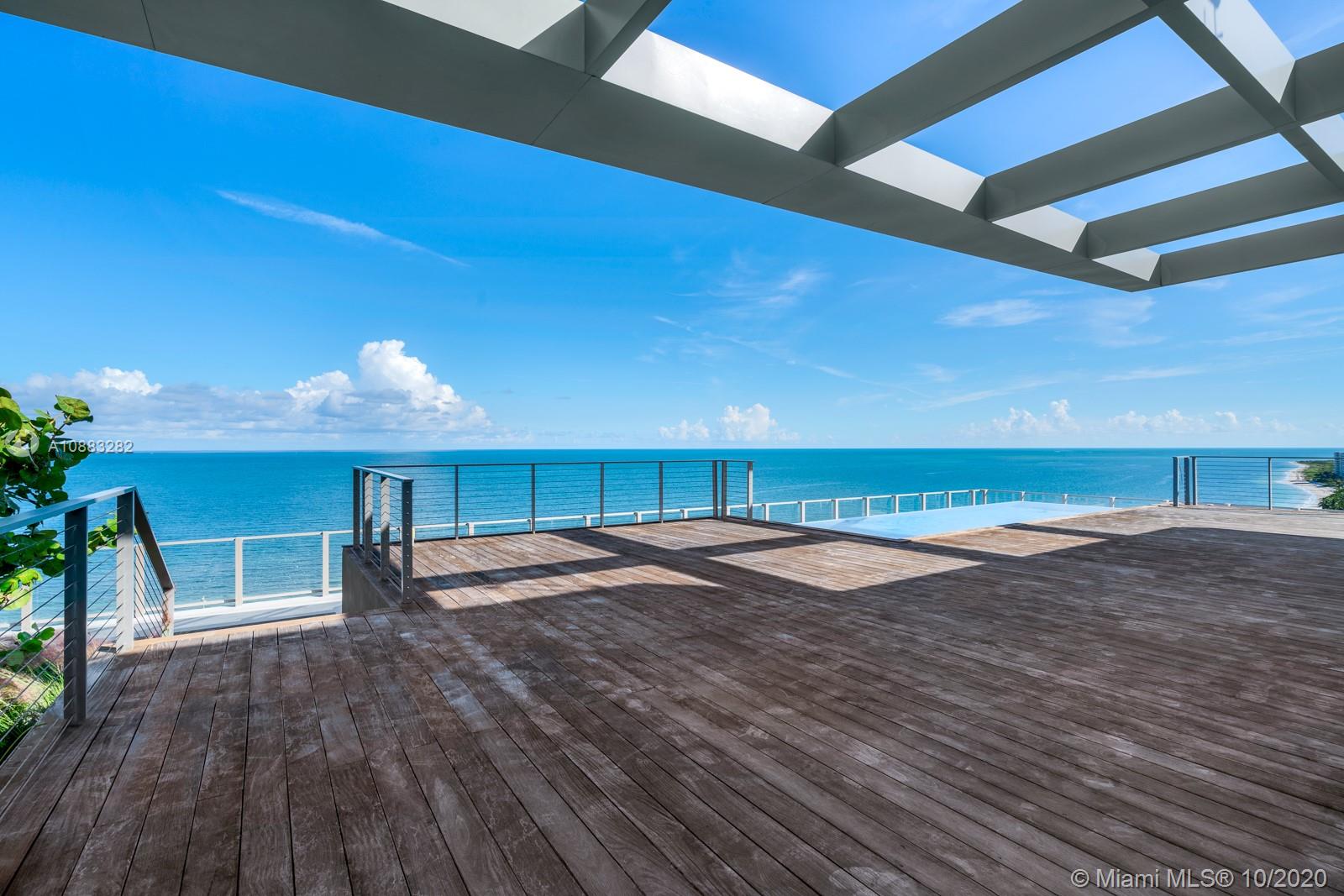360 Ocean Drive, Unit PH1S Key Biscayne, FL 33149 - Photo 15 of 30 a view of empty room with wooden floor