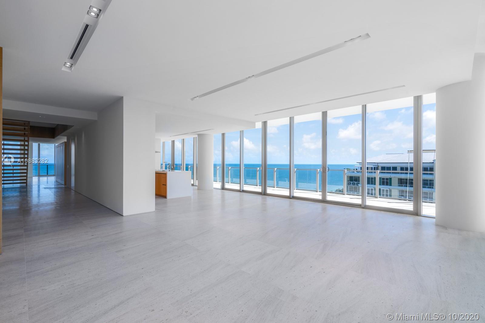 360 Ocean Drive, Unit PH1S Key Biscayne, FL 33149 - Photo 26 of 30 a view of an empty room with a sliding door