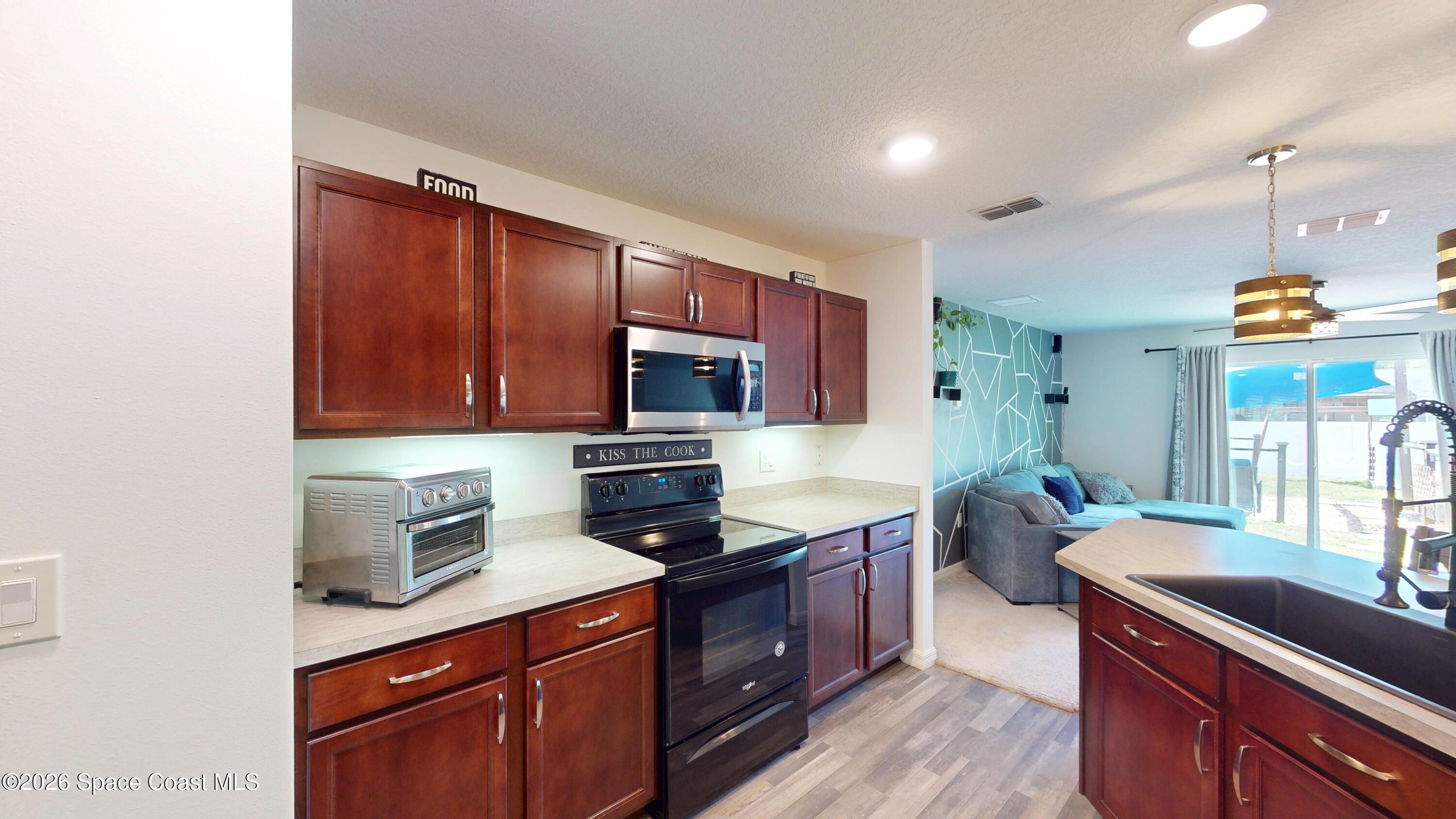 1441 Ranger Road Southeast Palm Bay, FL 32909 - Photo 8 of 38 1441-Ranger-Road-03022026_202134