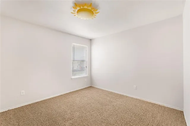 a bathroom with a bathtub shower sink vanity and toilet