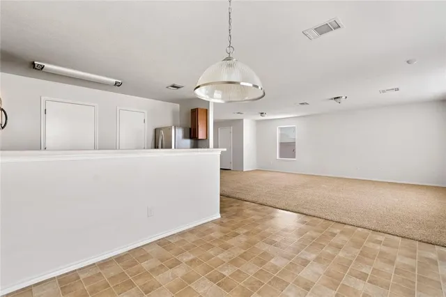 a view of a storage & utility room with washer and dryer