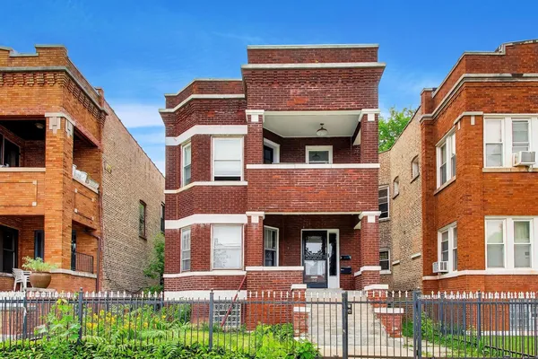 a front view of a multi story residential apartment building