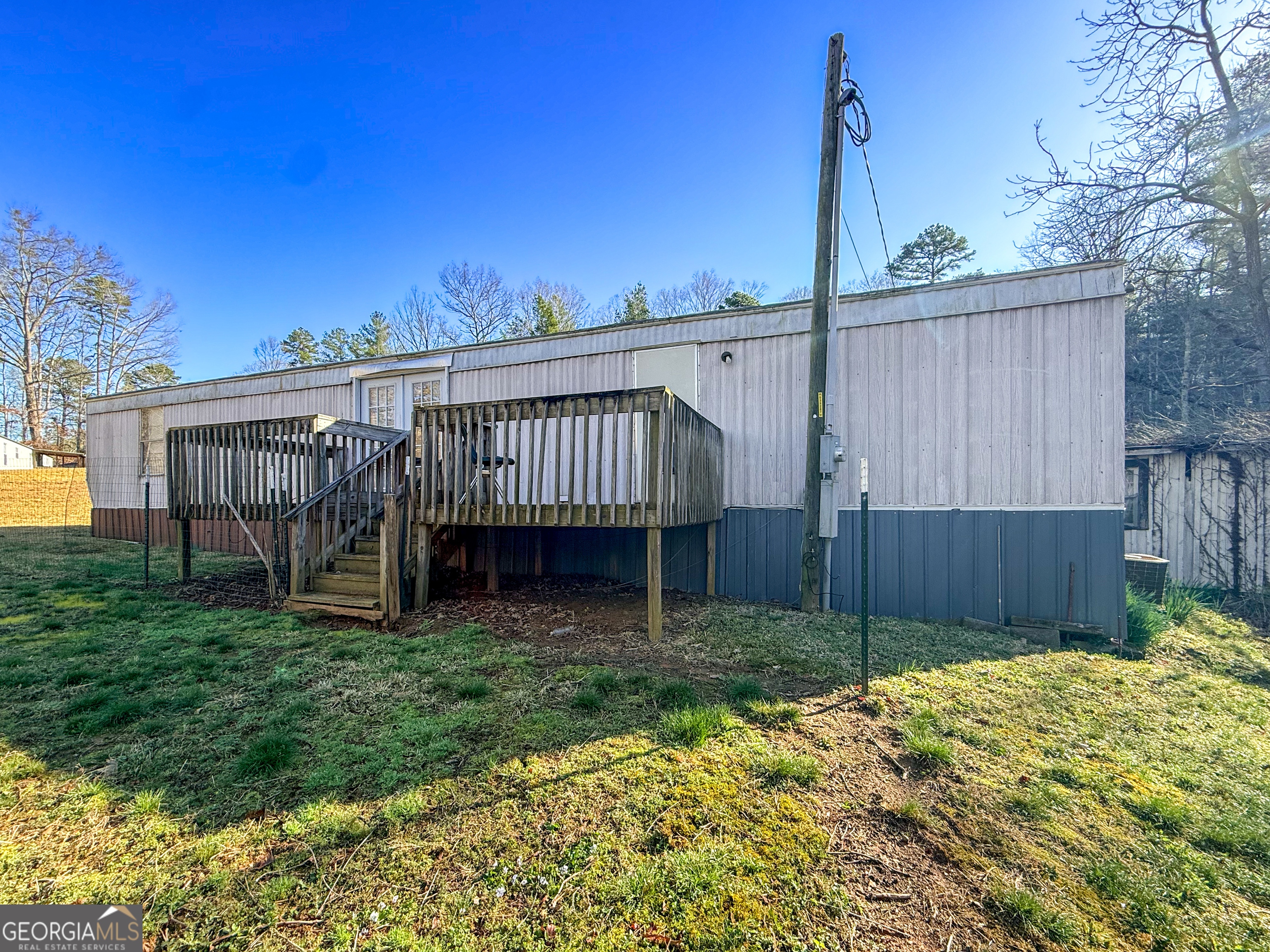1177 Twin River Orchard Road Demorest, GA 30535 - Photo 19 of 27 a view of a backyard with a deck
