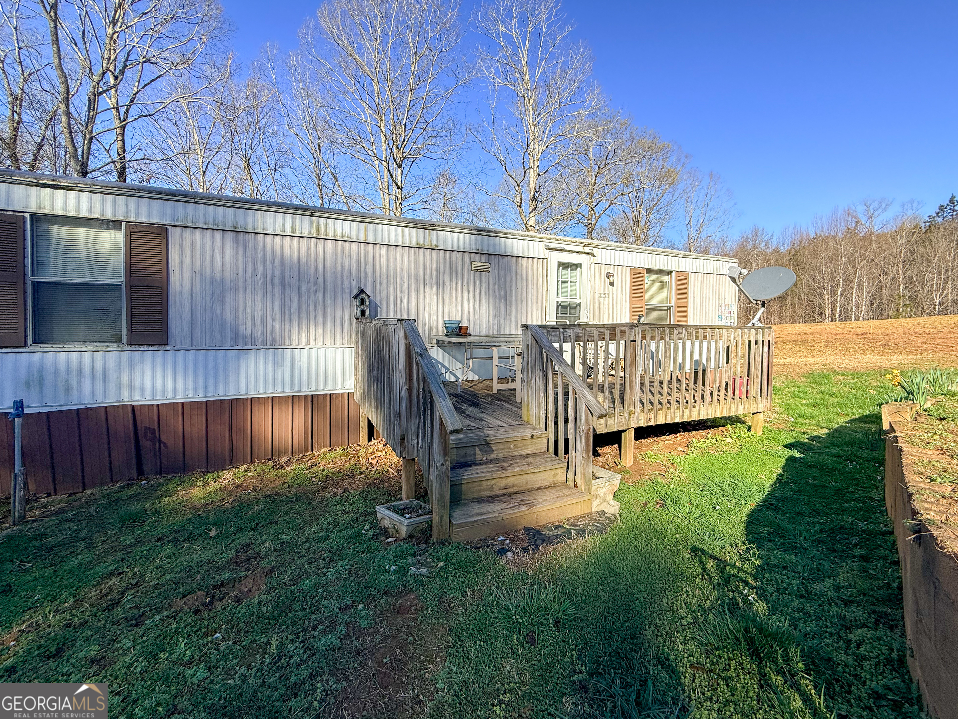1177 Twin River Orchard Road Demorest, GA 30535 - Photo 27 of 27 a view of a chair with wooden fence