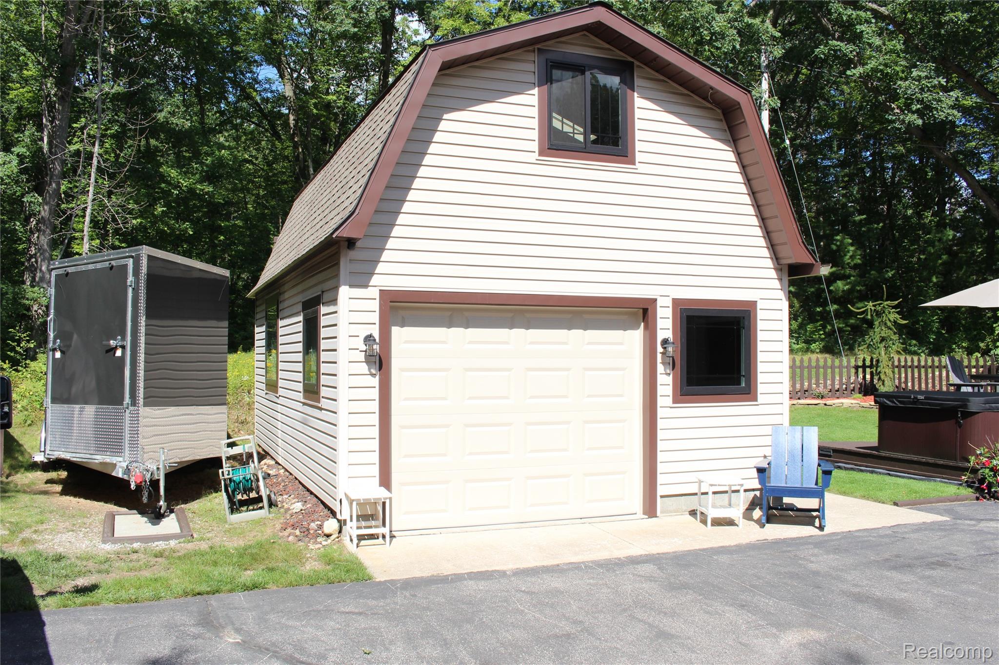 5799 Goodar Road South Branch, MI 48761 - Photo 10 of 58 Two-story detached garage with newer windows and roof and upper loft living area