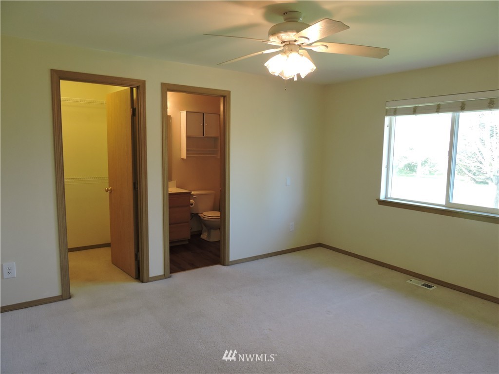 449 Spring Lane Sedro-Woolley, WA 98284 - Photo 5 of 11 a view of empty room with window