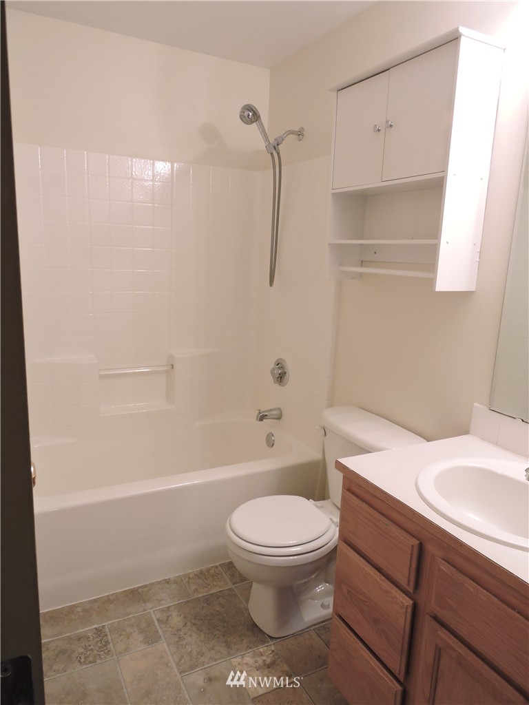 449 Spring Lane Sedro-Woolley, WA 98284 - Photo 8 of 11 a bathroom with a toilet a sink and shower