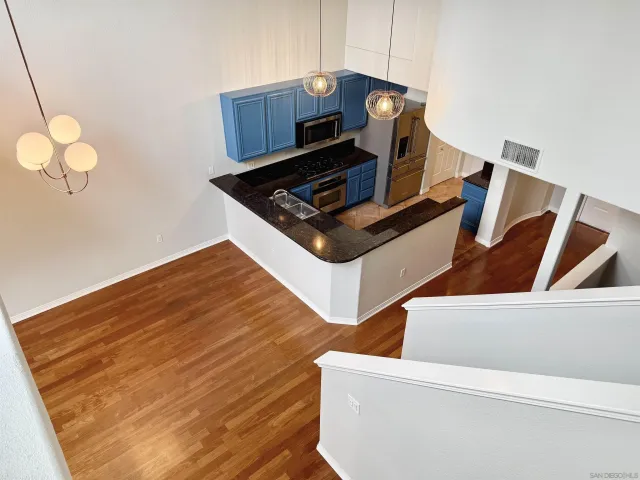 a living room with wooden floor