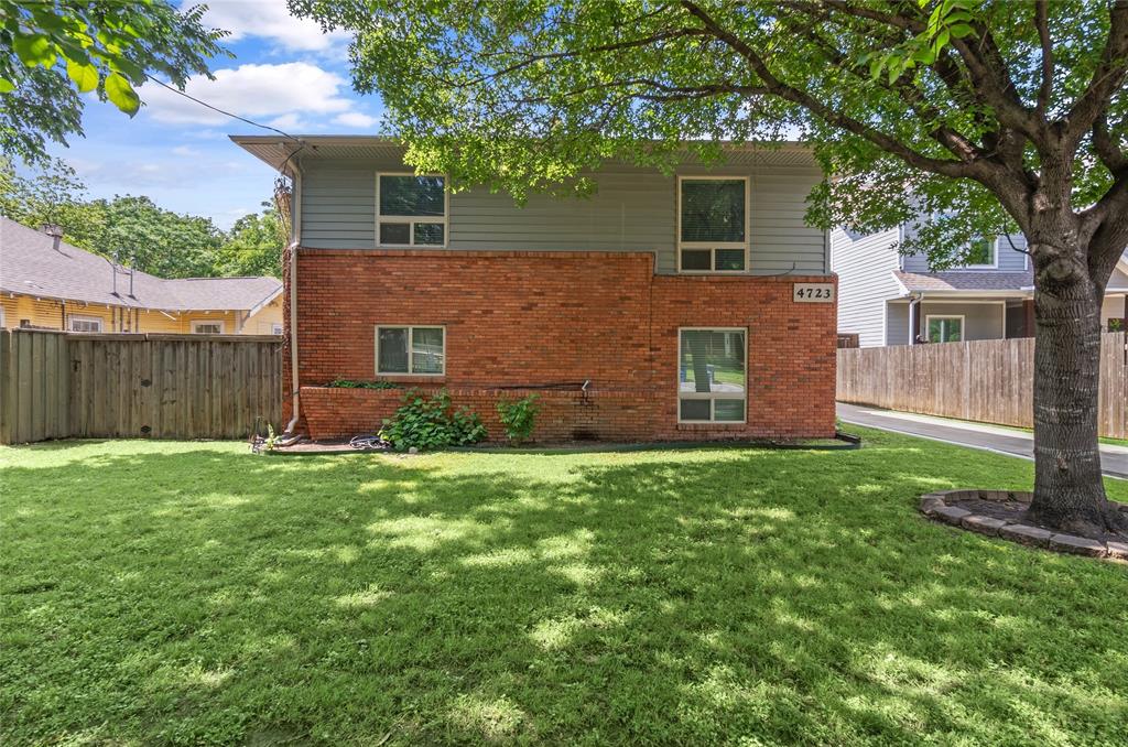 4723 Victor Street, Unit B Dallas, TX 75246 - Photo 12 of 12 Two-story residence featuring brick and siding exterior