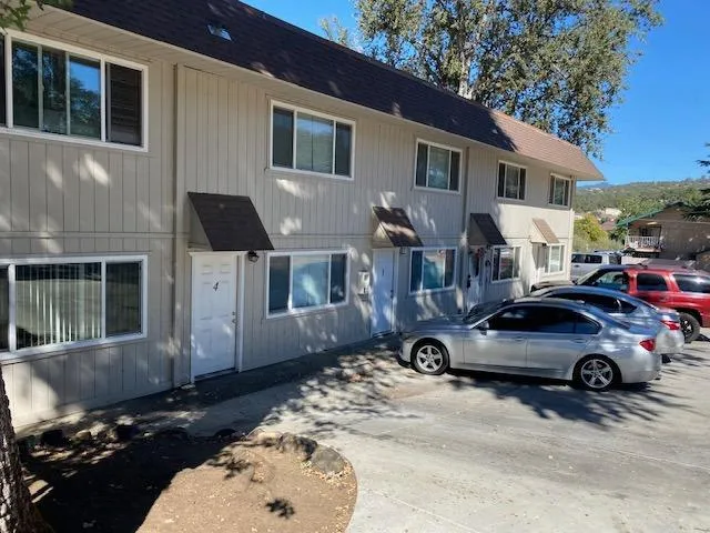 a car parked in front of a house