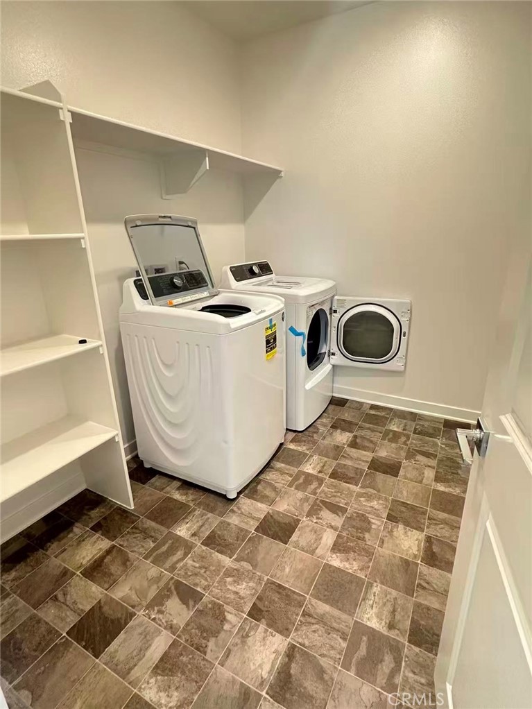 2595 Pheasant Way Ontario, CA 91761 - Photo 24 of 34 a utility room with washer and dryer