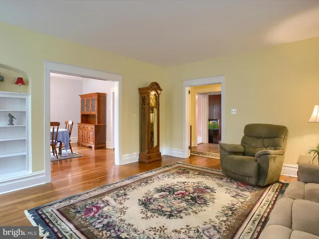 a view of living room with furniture and a window