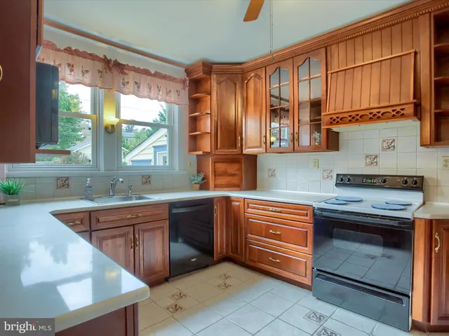 a sink sitting next to a window