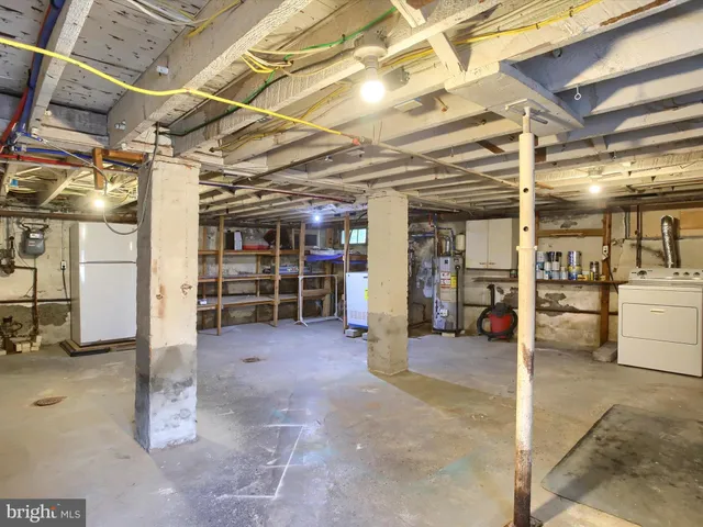 a view of a room with wooden walls