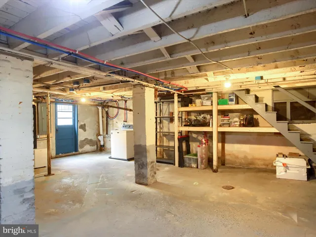 a front view of house with yard and outdoor seating