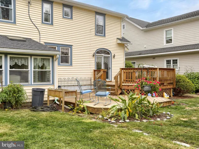 a view of a house with a swimming pool