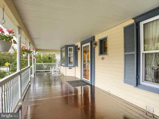 a view of a porch with chairs