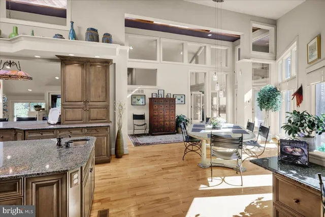 a living room with furniture window and a fireplace