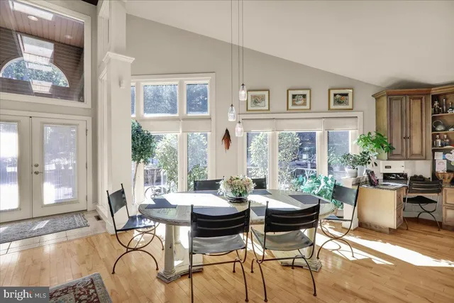 a living room with furniture or couch and a large window