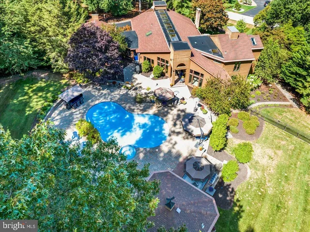 a kitchen with stainless steel appliances a stove sink and cabinets