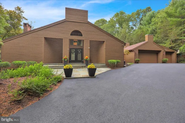 a kitchen with stainless steel appliances granite countertop a stove and a refrigerator