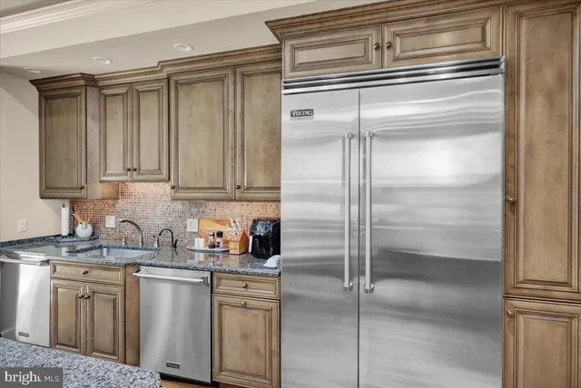 a view of a living room and entry way