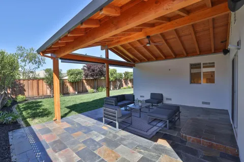 a building outdoor space with patio furniture