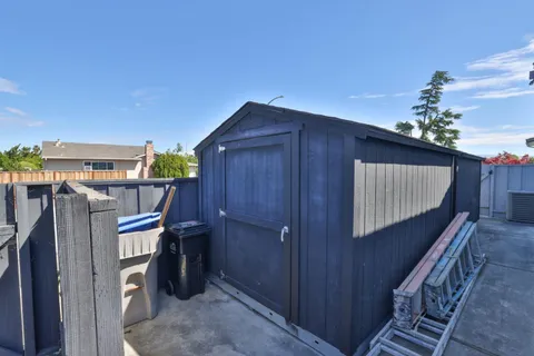 a view of entryway with wooden walls
