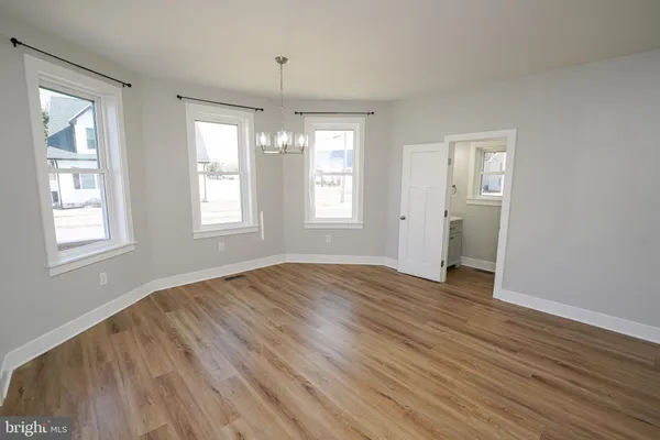 a bathroom with a sink a vanity and a mirror