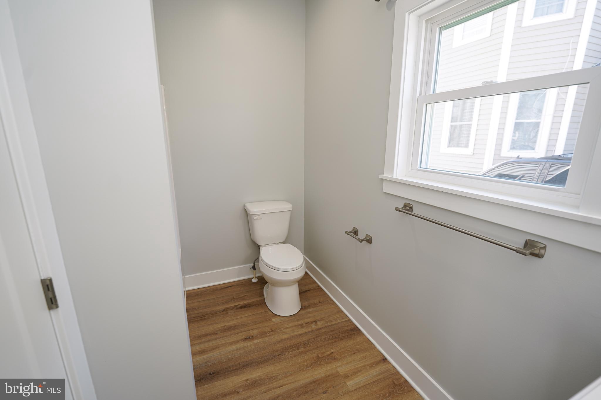 111 East Jewell Street Delmar, DE 19940 - Photo 25 of 59 a bathroom with a toilet and a window