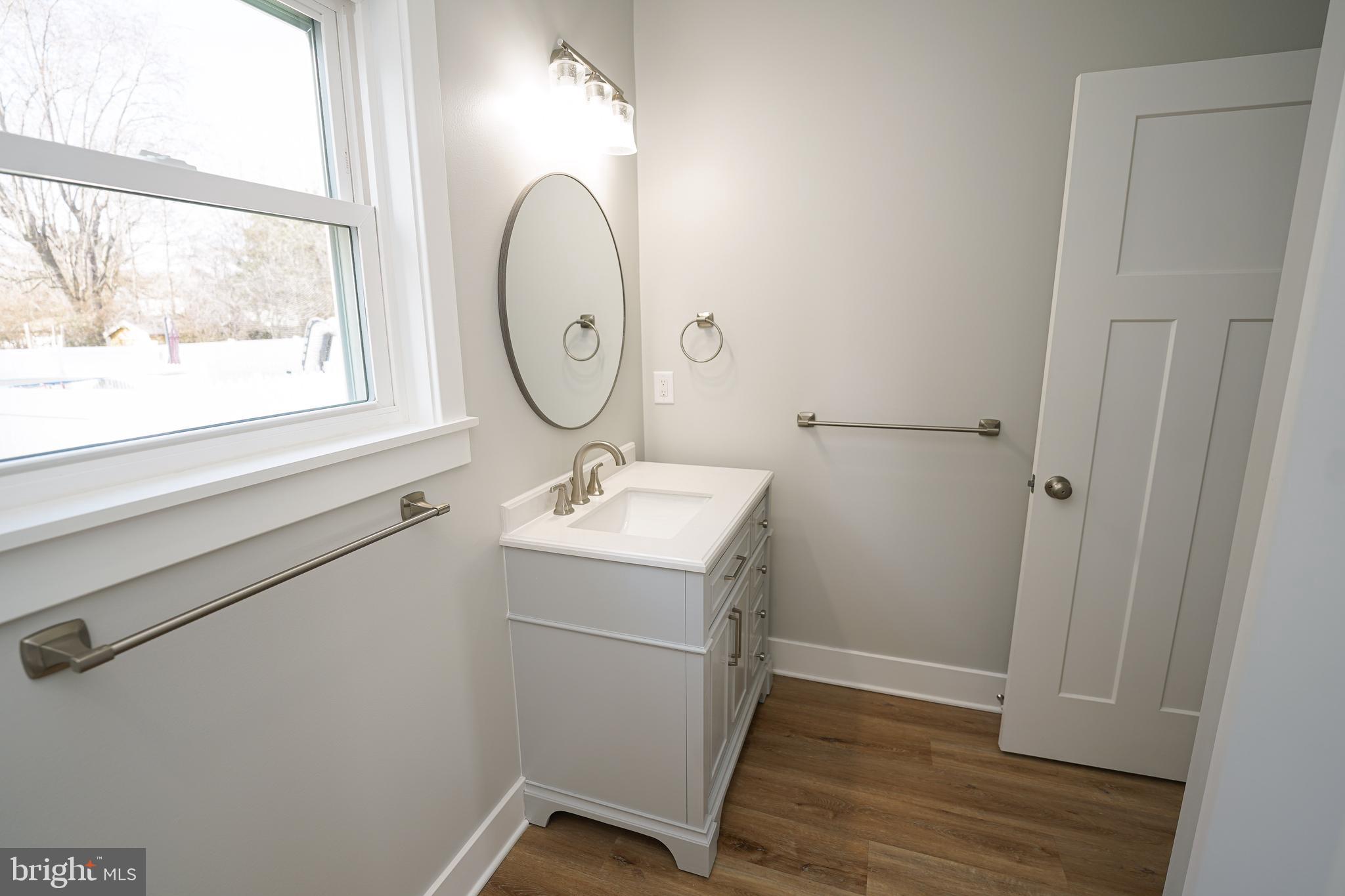 111 East Jewell Street Delmar, DE 19940 - Photo 26 of 59 a utility room with sink dryer and washer