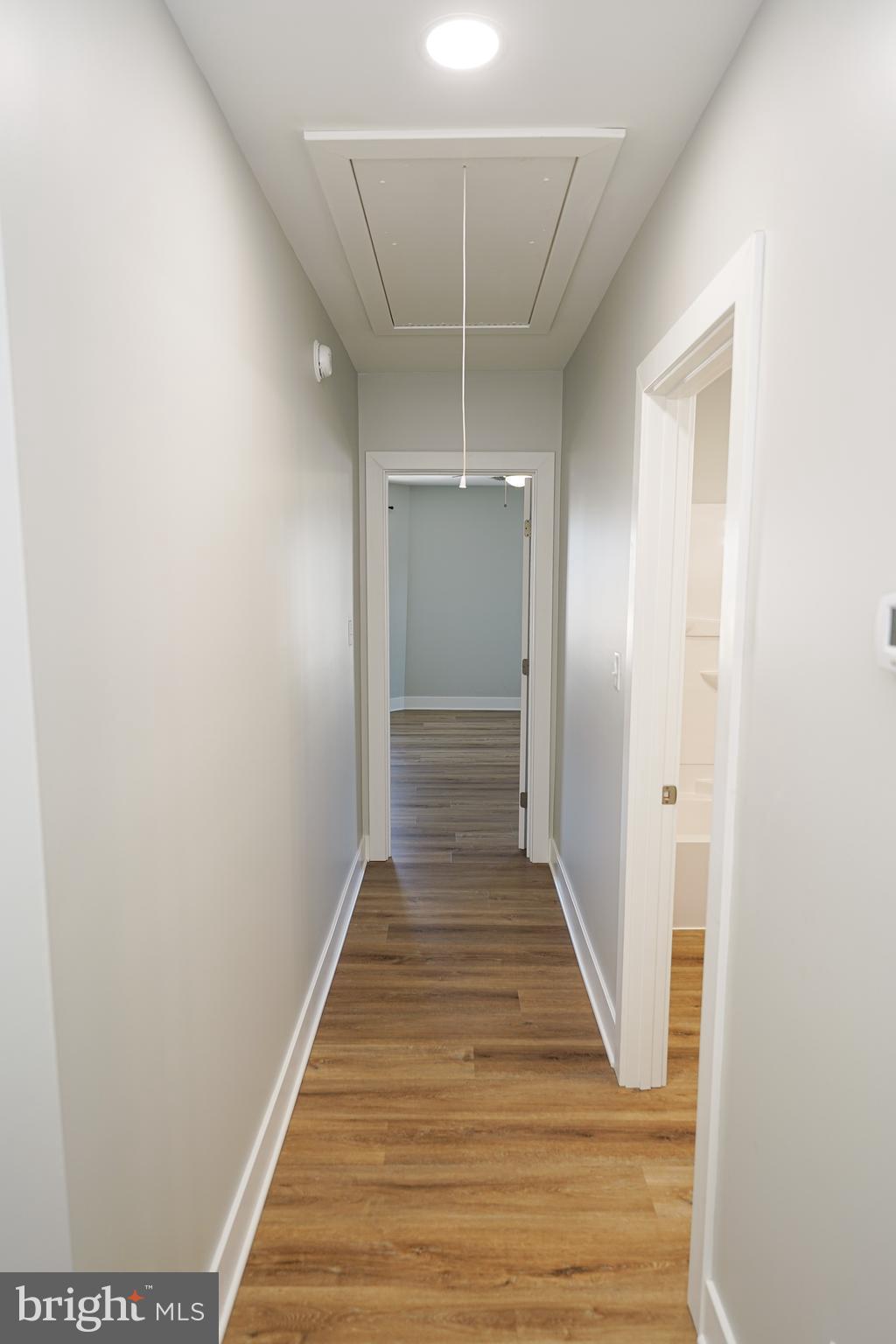 111 East Jewell Street Delmar, DE 19940 - Photo 33 of 59 a view of a hallway with wooden floor