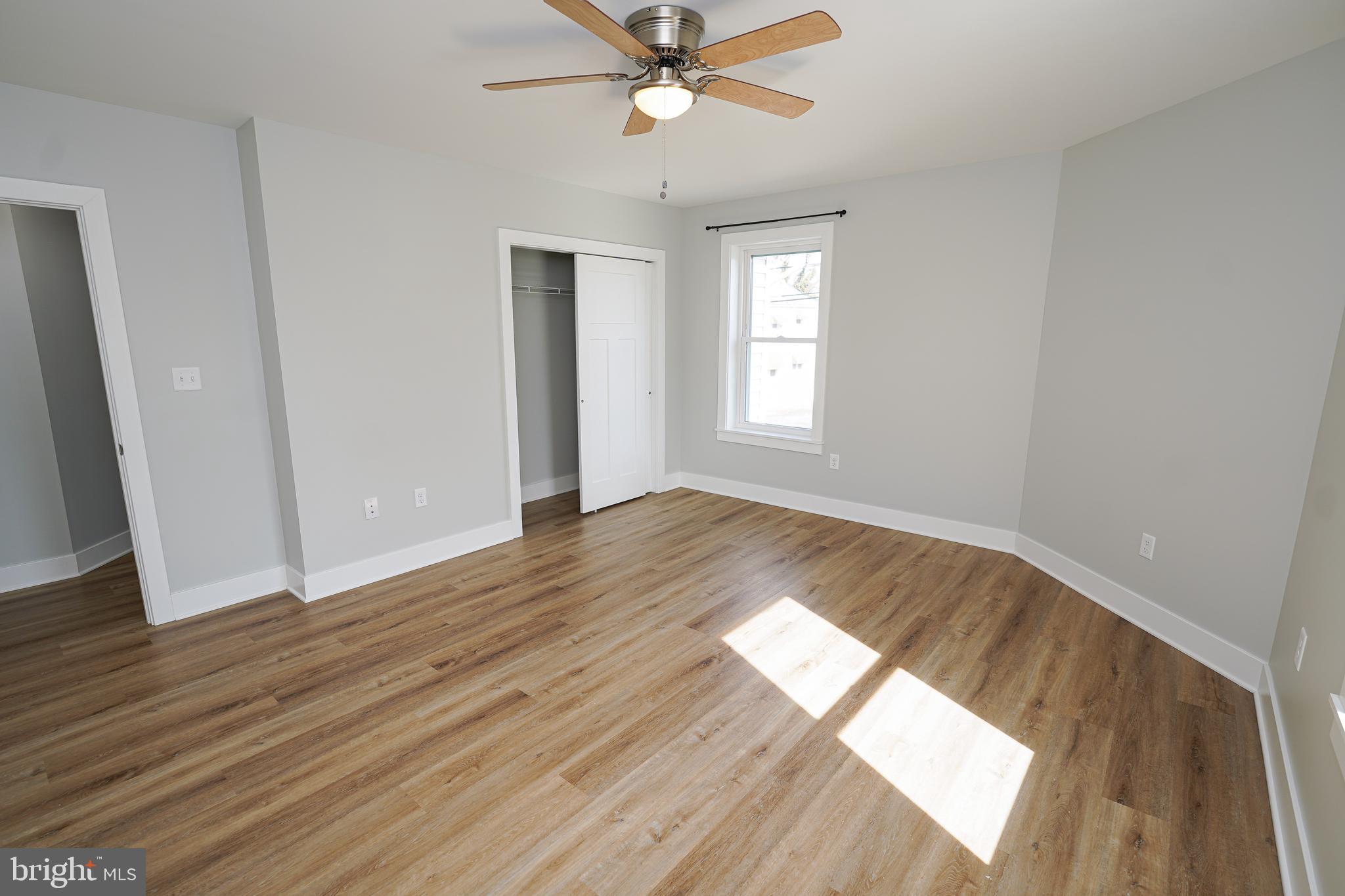 111 East Jewell Street Delmar, DE 19940 - Photo 39 of 59 wooden floor in an empty room with a window