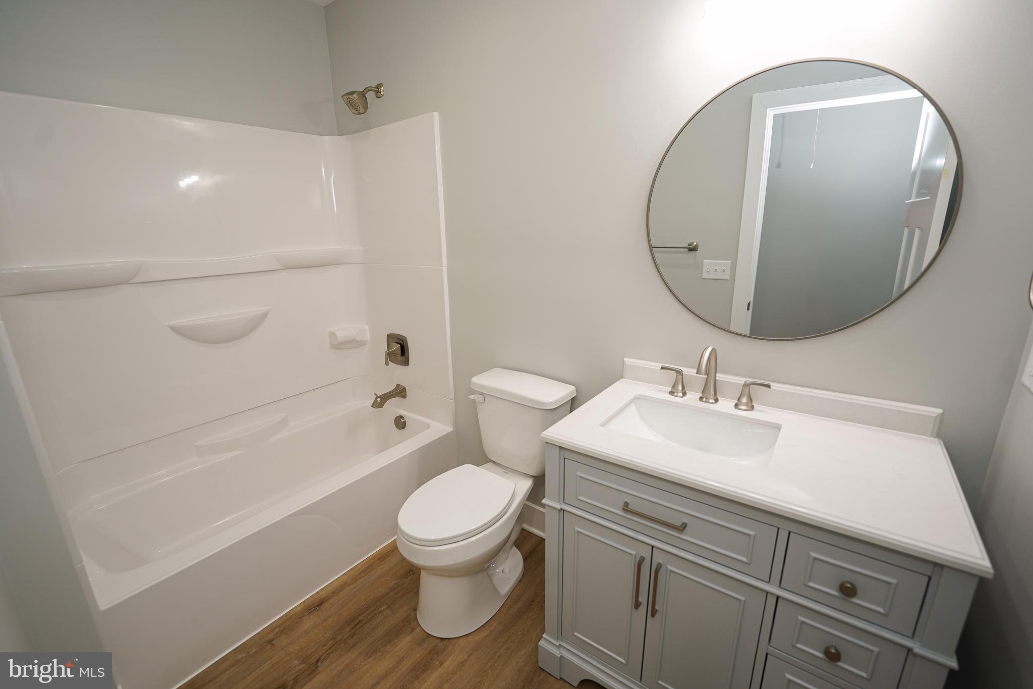 111 East Jewell Street Delmar, DE 19940 - Photo 47 of 59 a bathroom with a sink toilet and shower