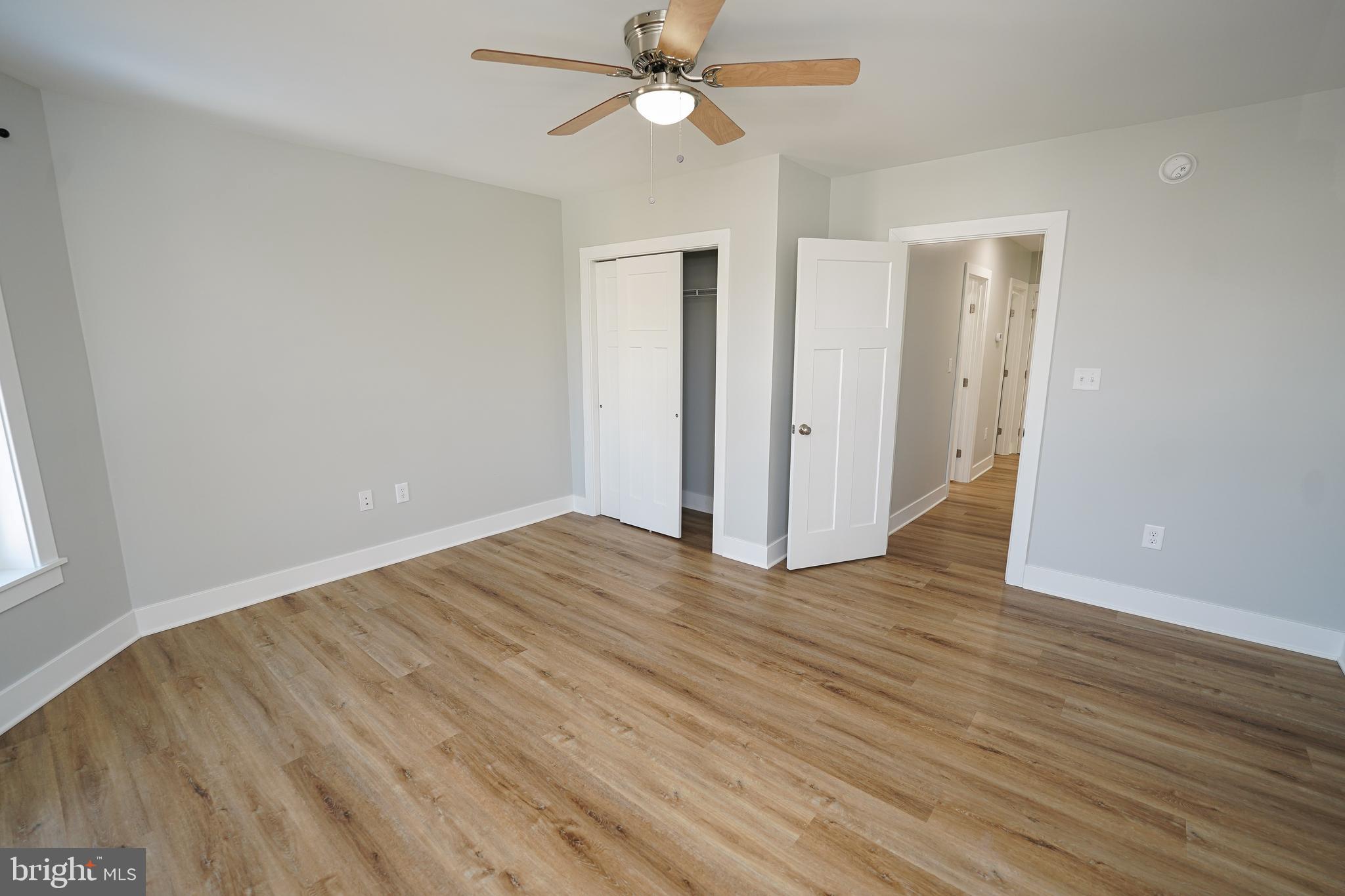 111 East Jewell Street Delmar, DE 19940 - Photo 51 of 59 wooden floor in an empty room with a window