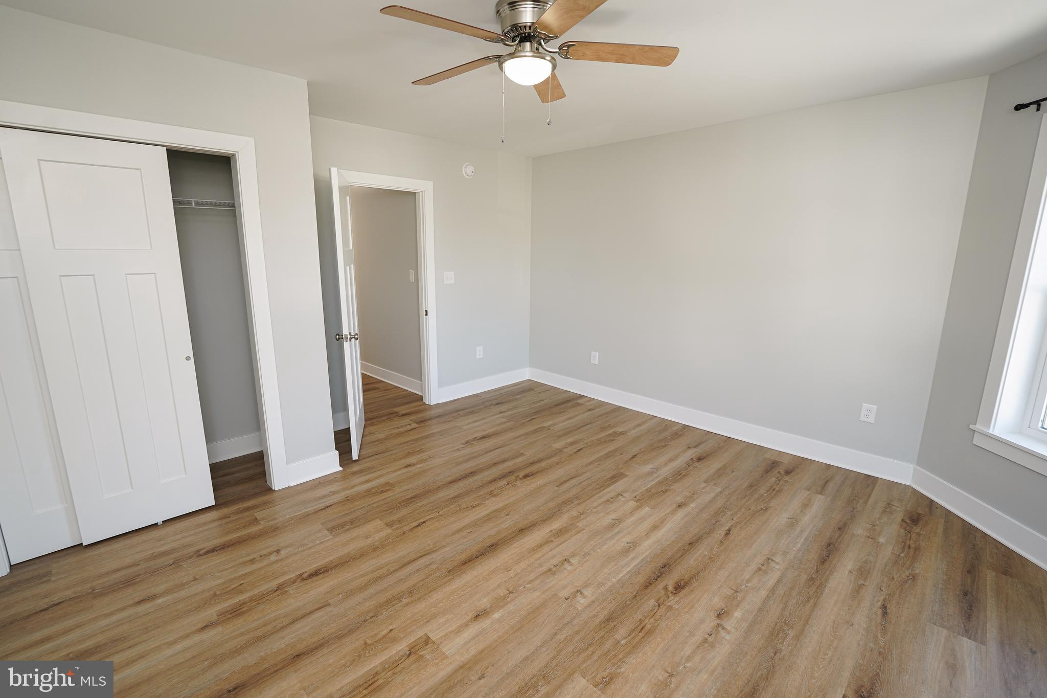111 East Jewell Street Delmar, DE 19940 - Photo 52 of 59 wooden floor in an empty room with a window