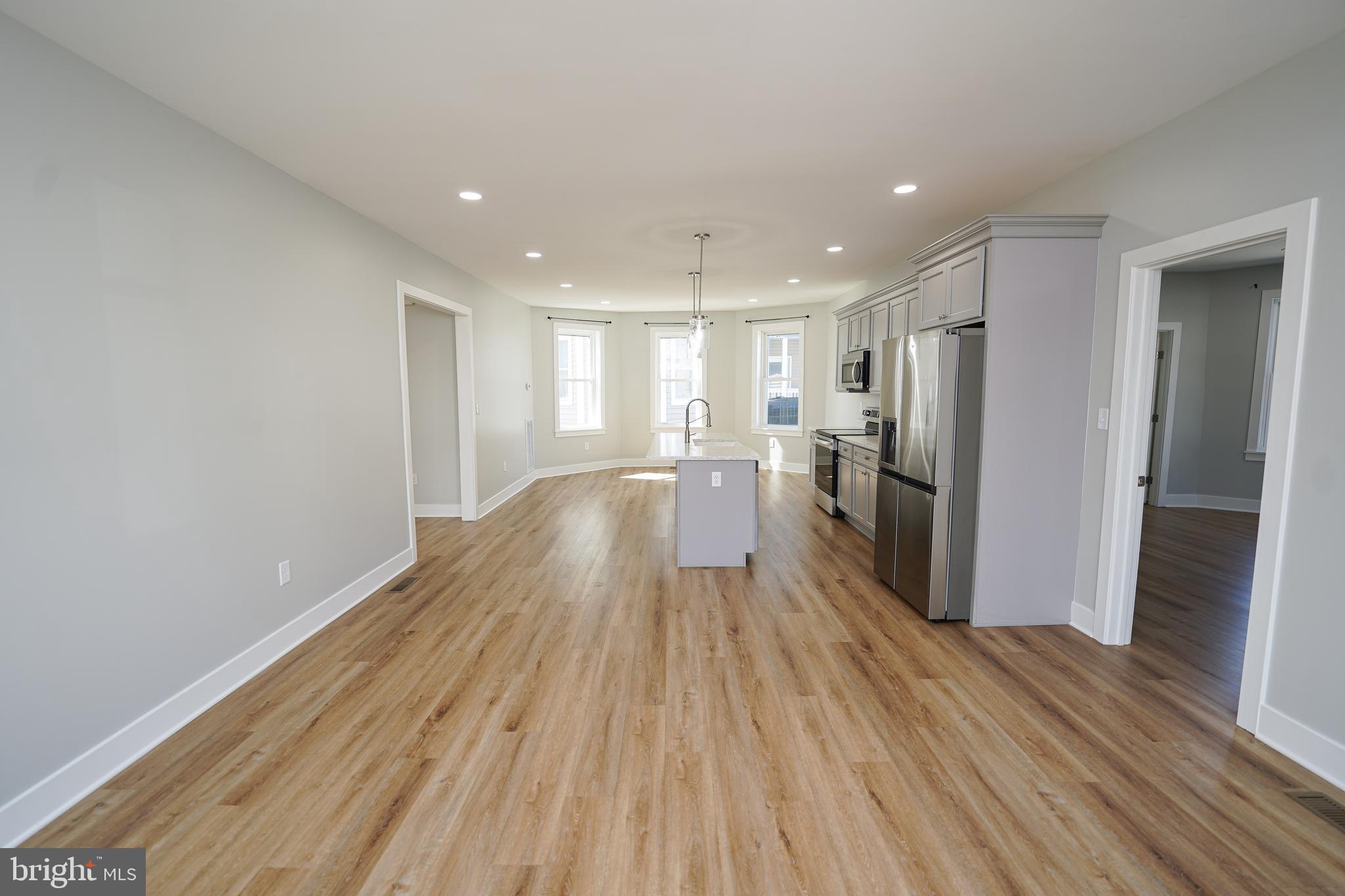 111 East Jewell Street Delmar, DE 19940 - Photo 10 of 59 a view of empty room with wooden floor