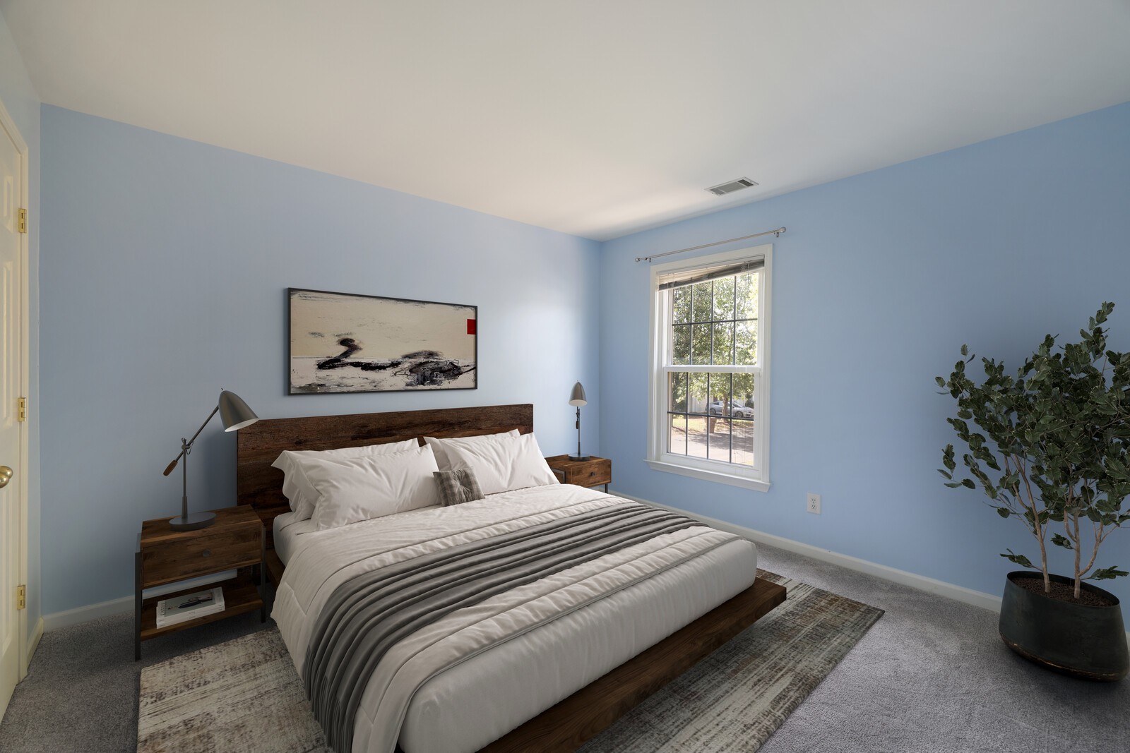 3405 Old Anderson Road, Unit 231 Antioch, TN 37013 - Photo 12 of 18 a bedroom with a bed and a potted plant