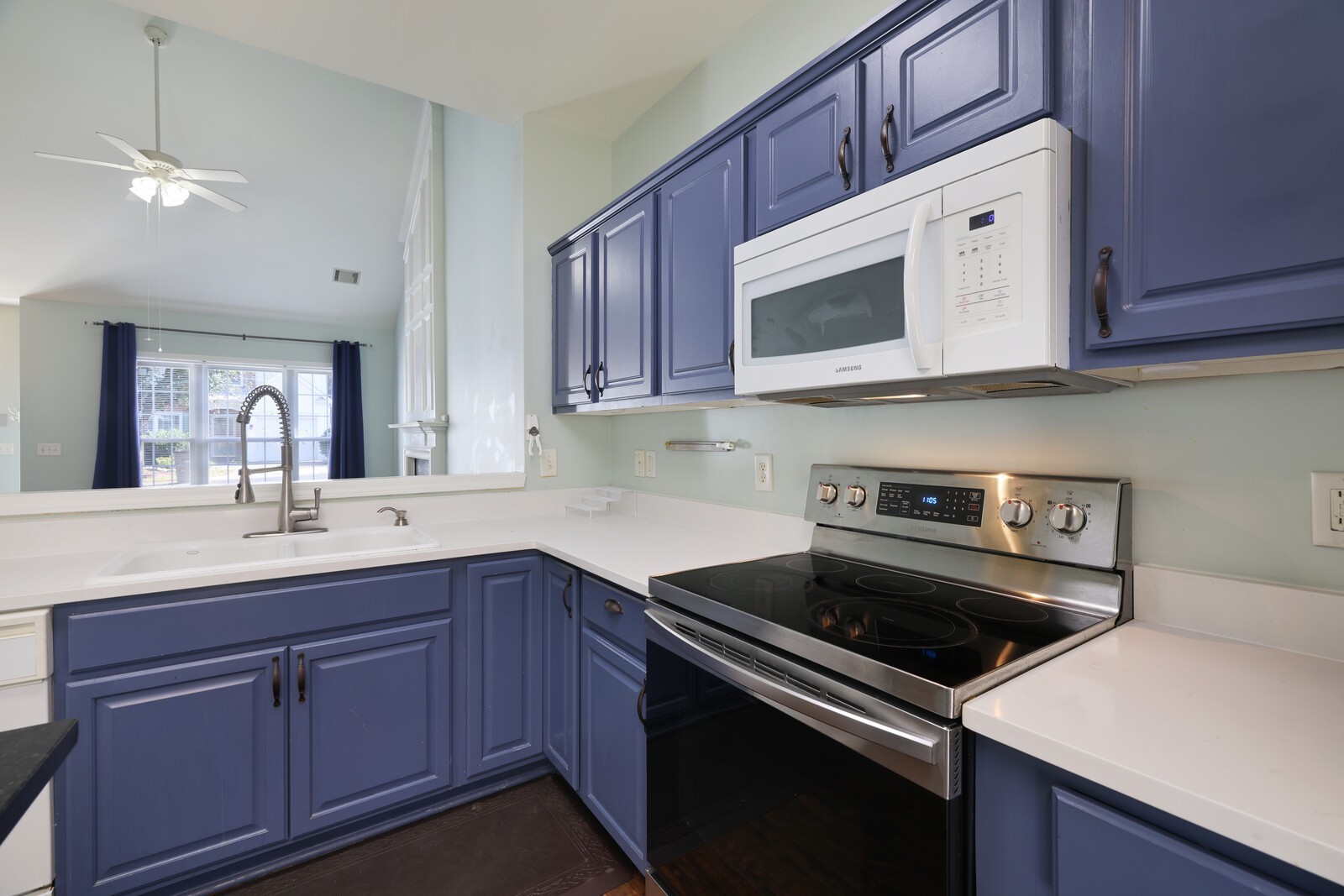 3405 Old Anderson Road, Unit 231 Antioch, TN 37013 - Photo 5 of 18 a kitchen with a sink stove and cabinets